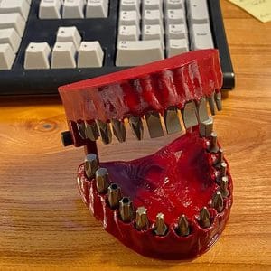 denture drill bit holder