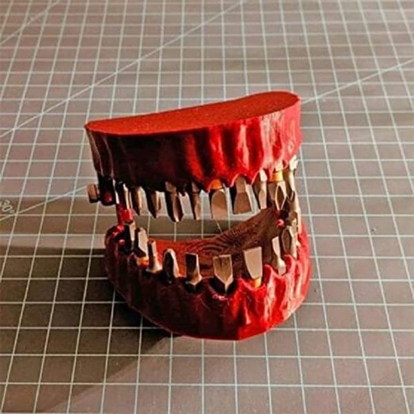 denture drill bit holder