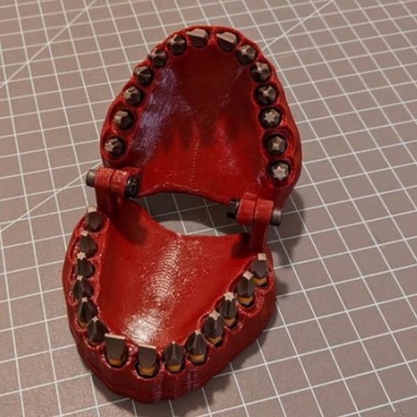 denture drill bit holder