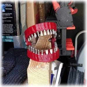 denture drill bit holder